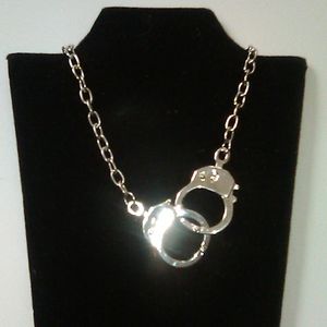 Chain necklace w/ handcuff charm
